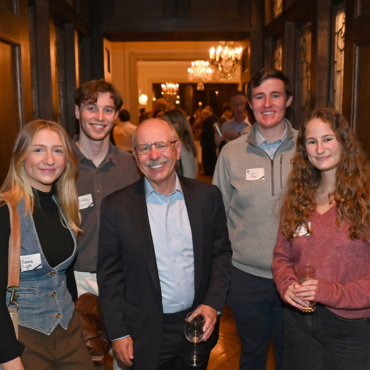 Five UCD alumni at a global event in New York.